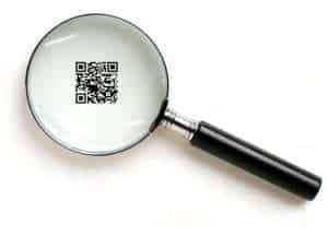 qr code authenticity checks - qr code under magnifying glass