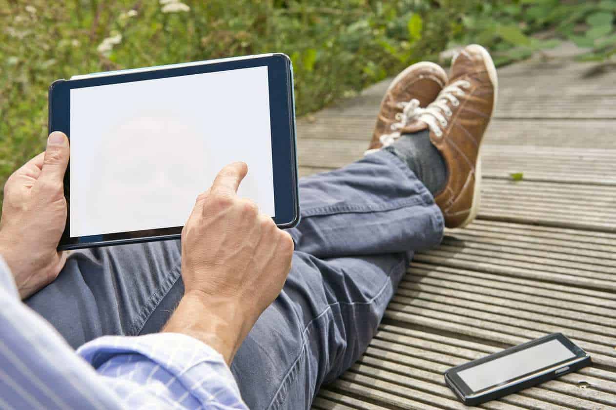 wearable technology man outside sun tablets