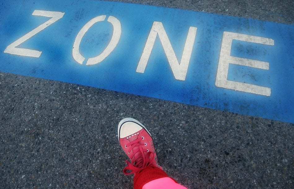 Heads-down tribe walking path - Zone area marked for walking - pink sneaker