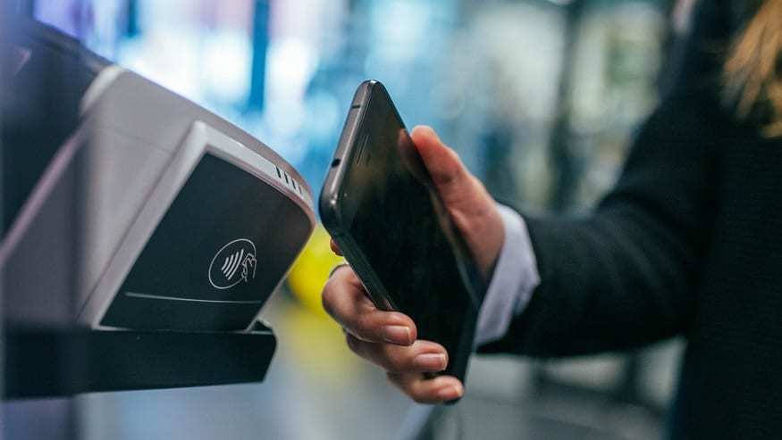 NFC payments - woman with Android phone