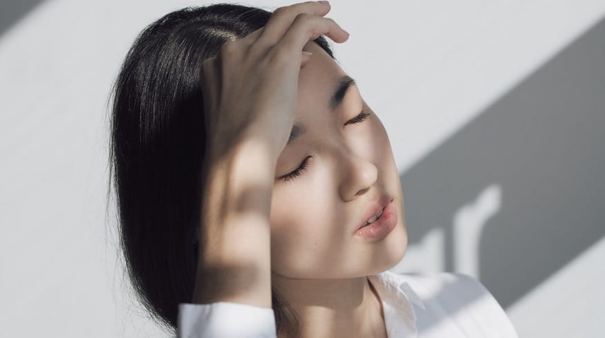 Migraine health app - Woman with headache