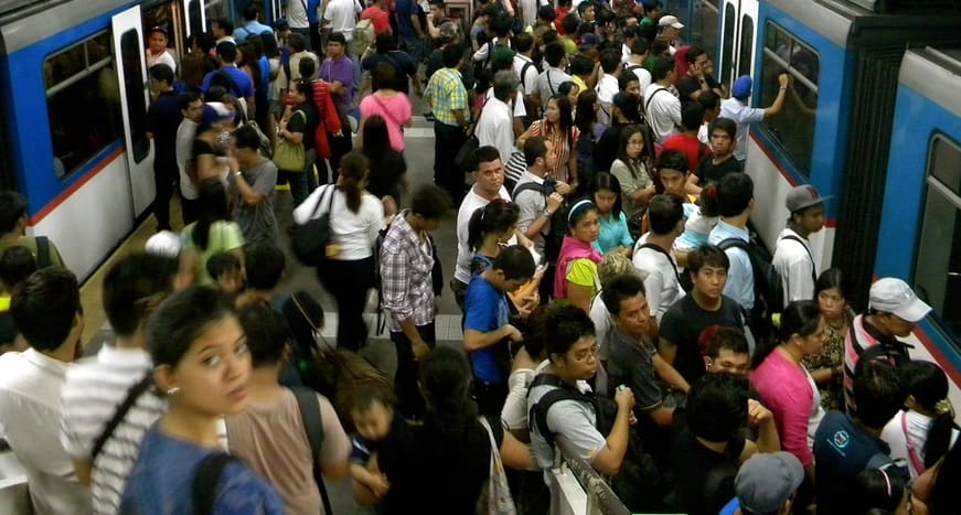 QR code transport ticketing system - Commuters in station