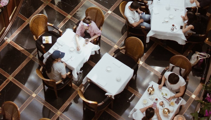 Restaurant QR codes - People sitting at tables inside restaurant