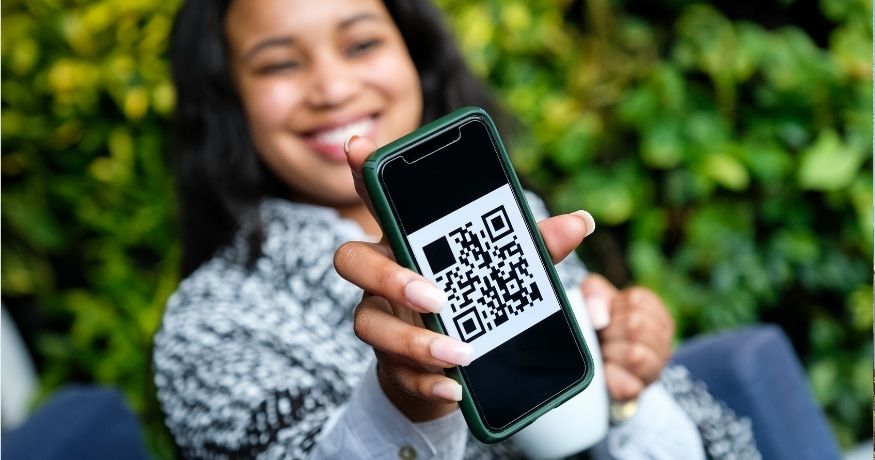 QR code campaign - person displaying QR code on phone