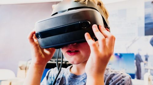 Virtual reality - kid using VR headset