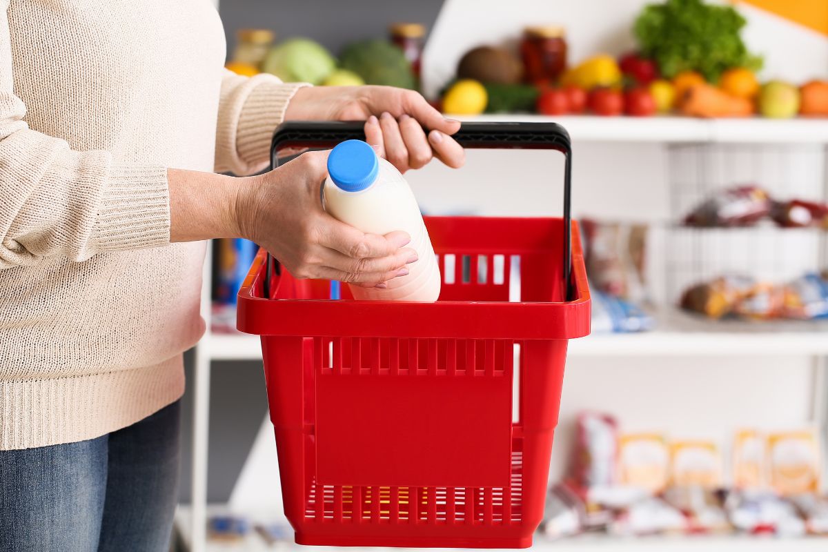QR codes - Shopper putting milk in basket