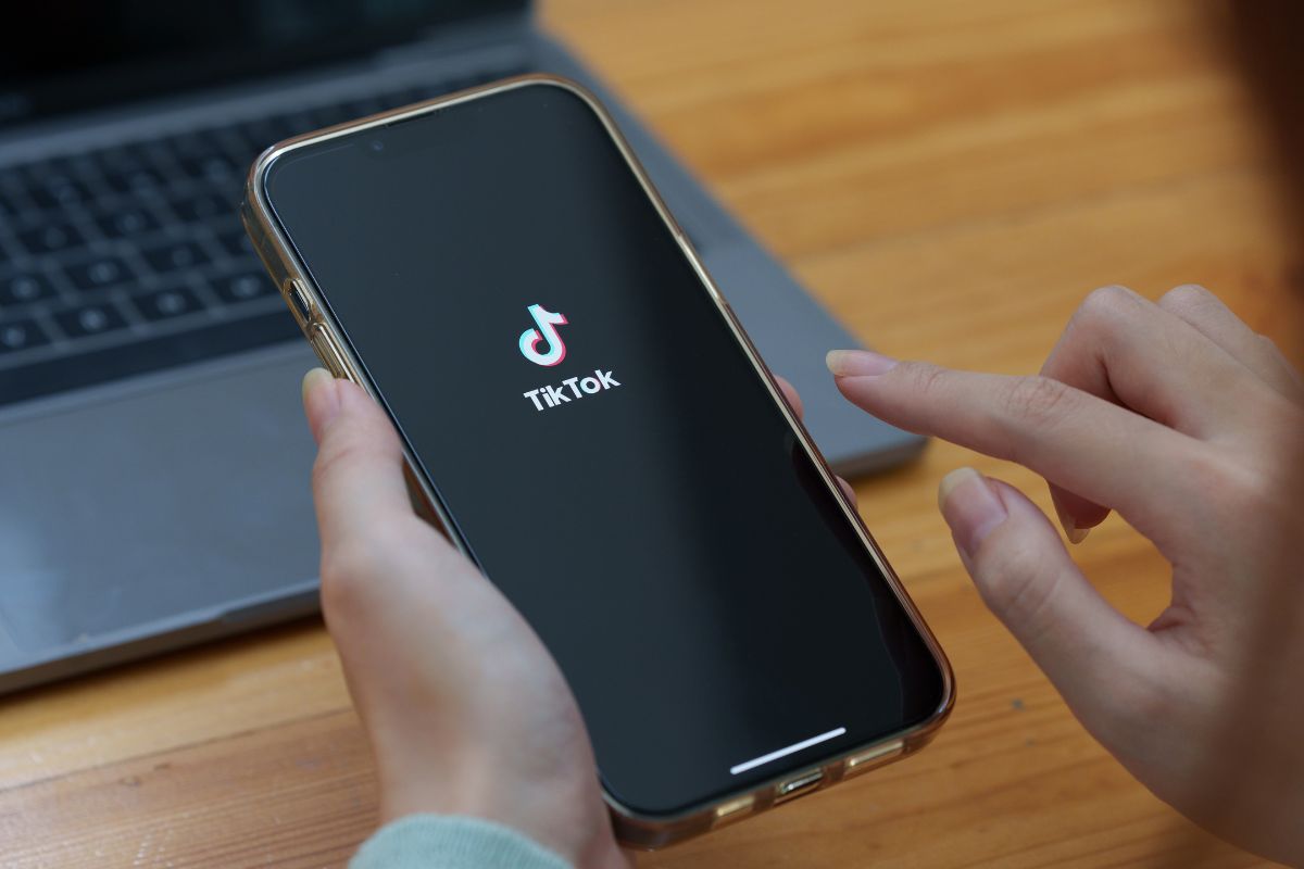 TikTok ban - Person using the app on phone