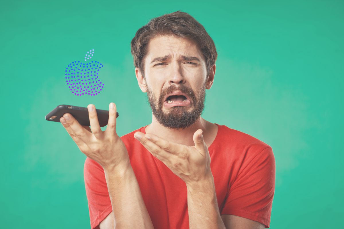 App store - Man looking upset by what he's seen on phone - apple logo