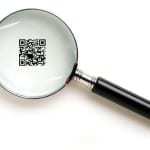 qr code authenticity checks - qr code under magnifying glass