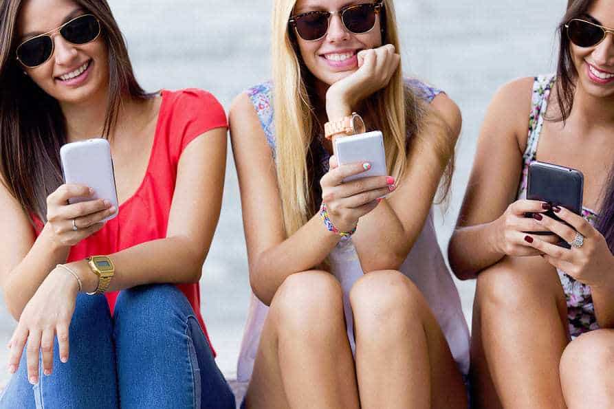 mobile devices technology summer - girls on phone