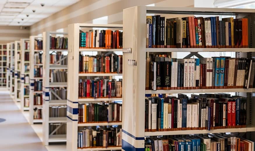 School library QR codes - library shelves with books