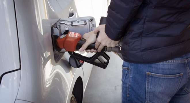 Gas Station Mobile Payments - person refuelling car
