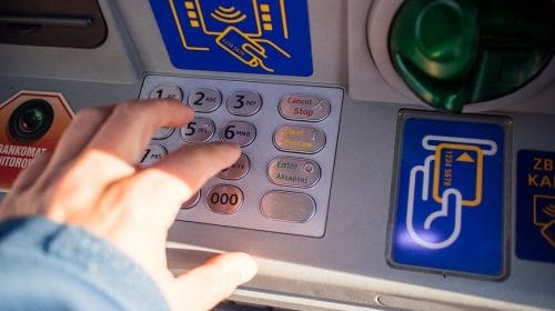 NFC technology - person using ATM