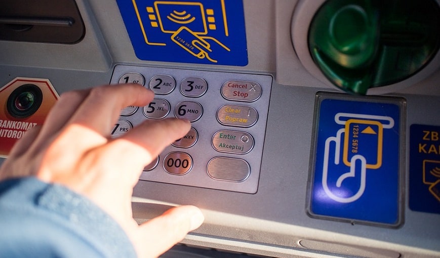 NFC technology person using ATM