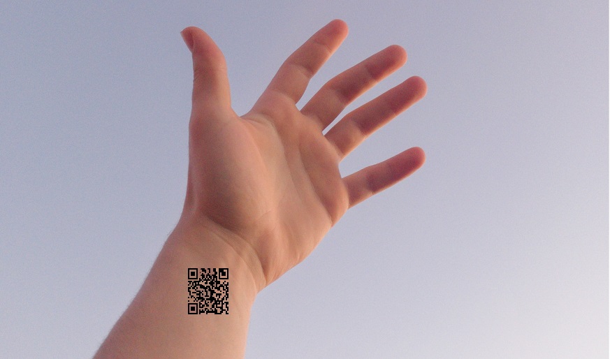 QR code tattoos - Image of hand with a QR code on wrist