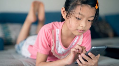 Instagram for kids - child using mobile phone