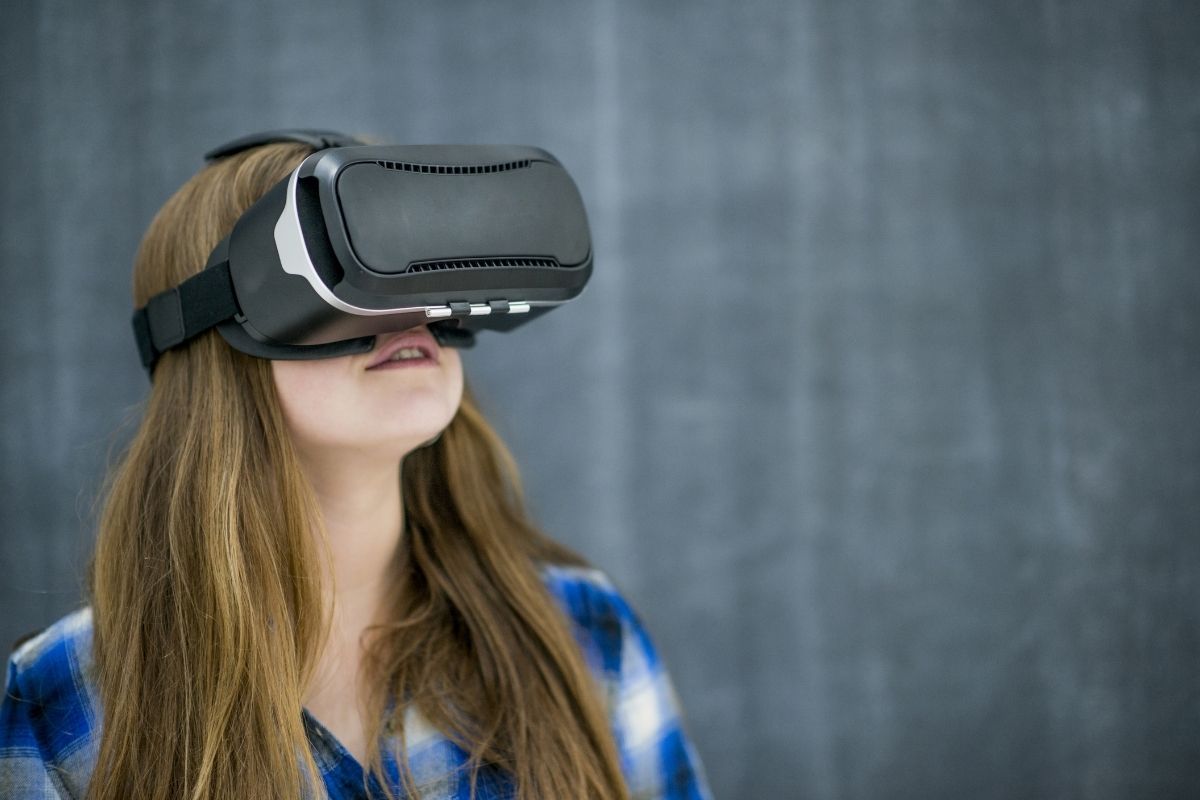 VR technology - young woman wearing VR headset
