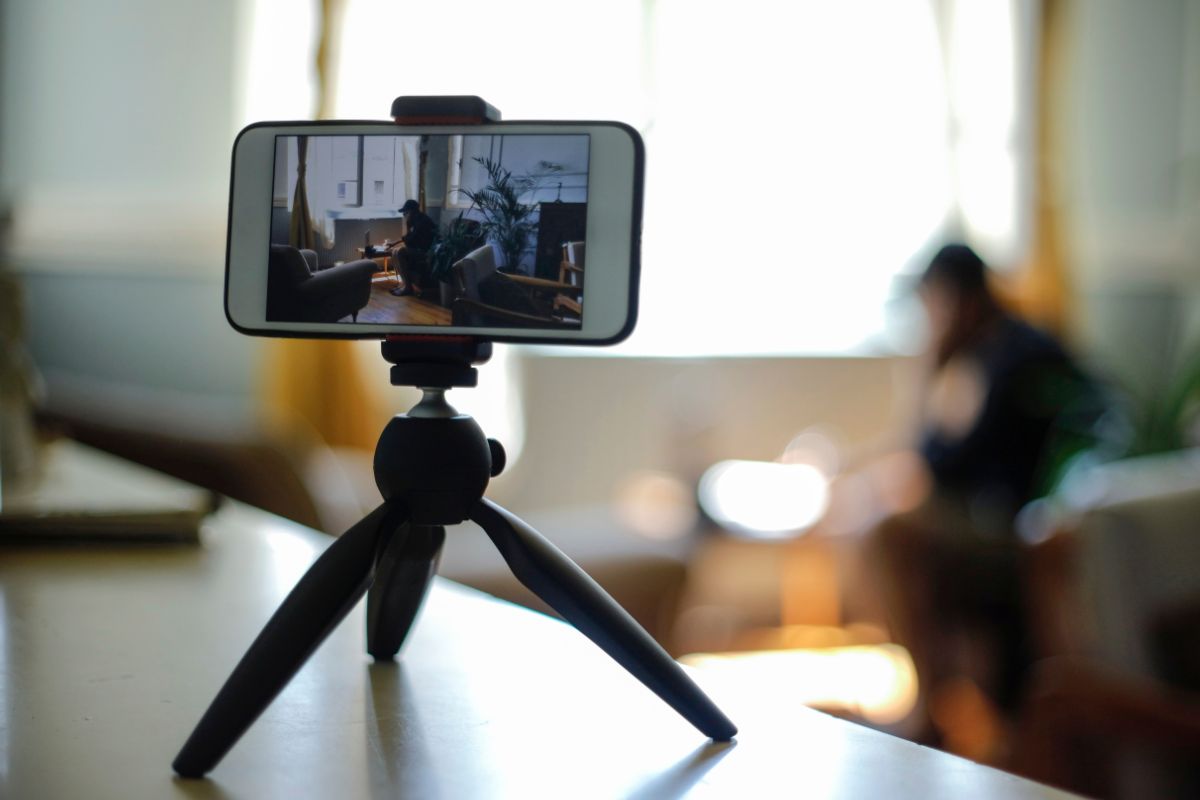 TikTok - Person shooting video in landscape mode