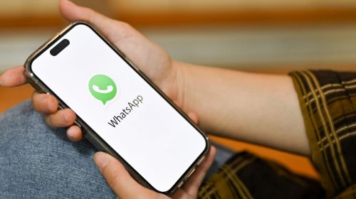 Text message editing - Person using WhatsApp app