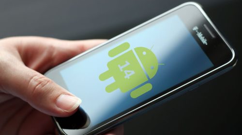 Android 14 - Person using mobile phone