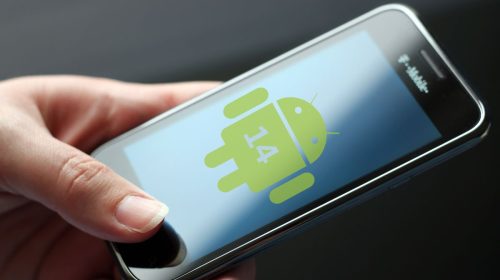 Android 14 - Person using mobile phone