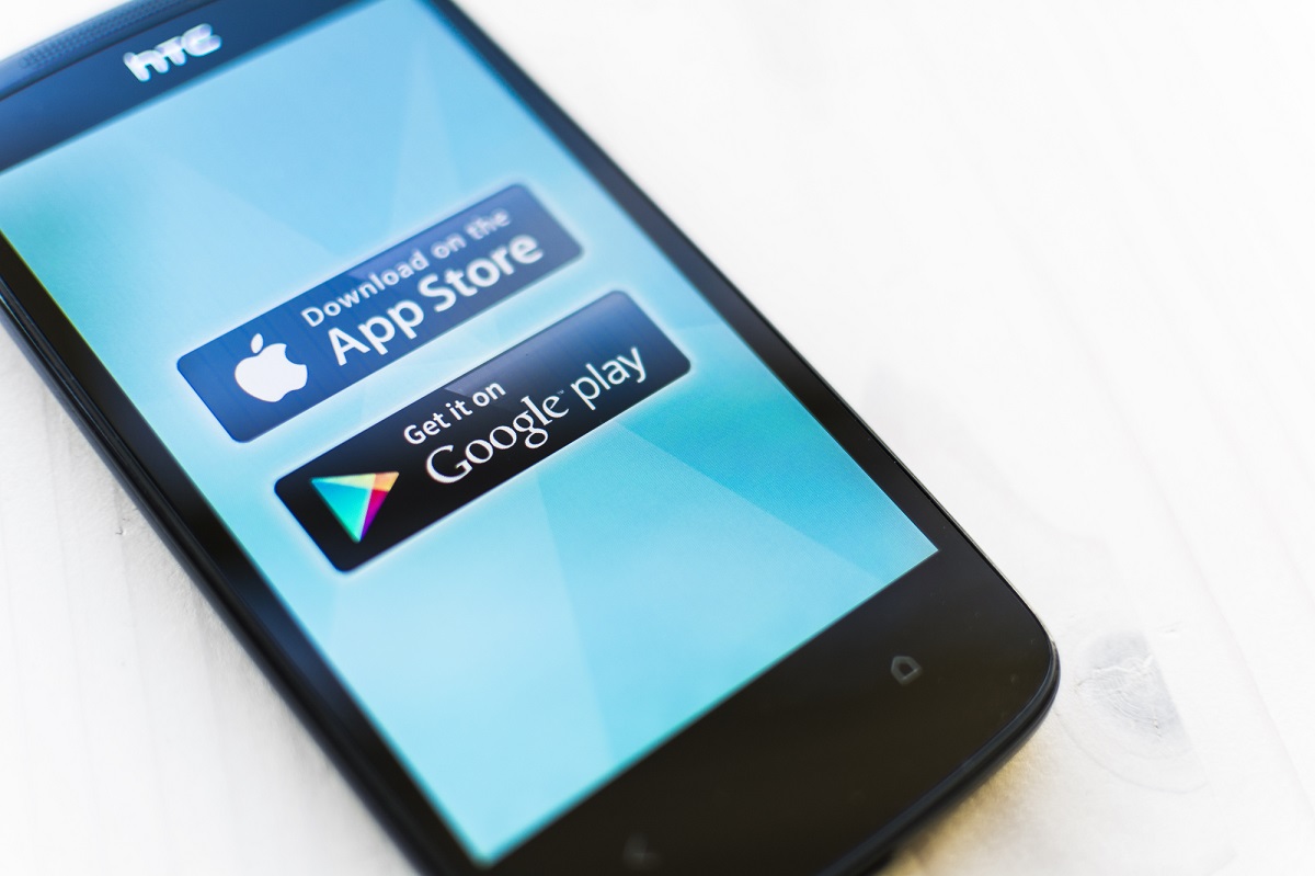 Facebook to become an iOS and app store in Europe 2 Depositphotos - App store and Google Play Store on mobile phone