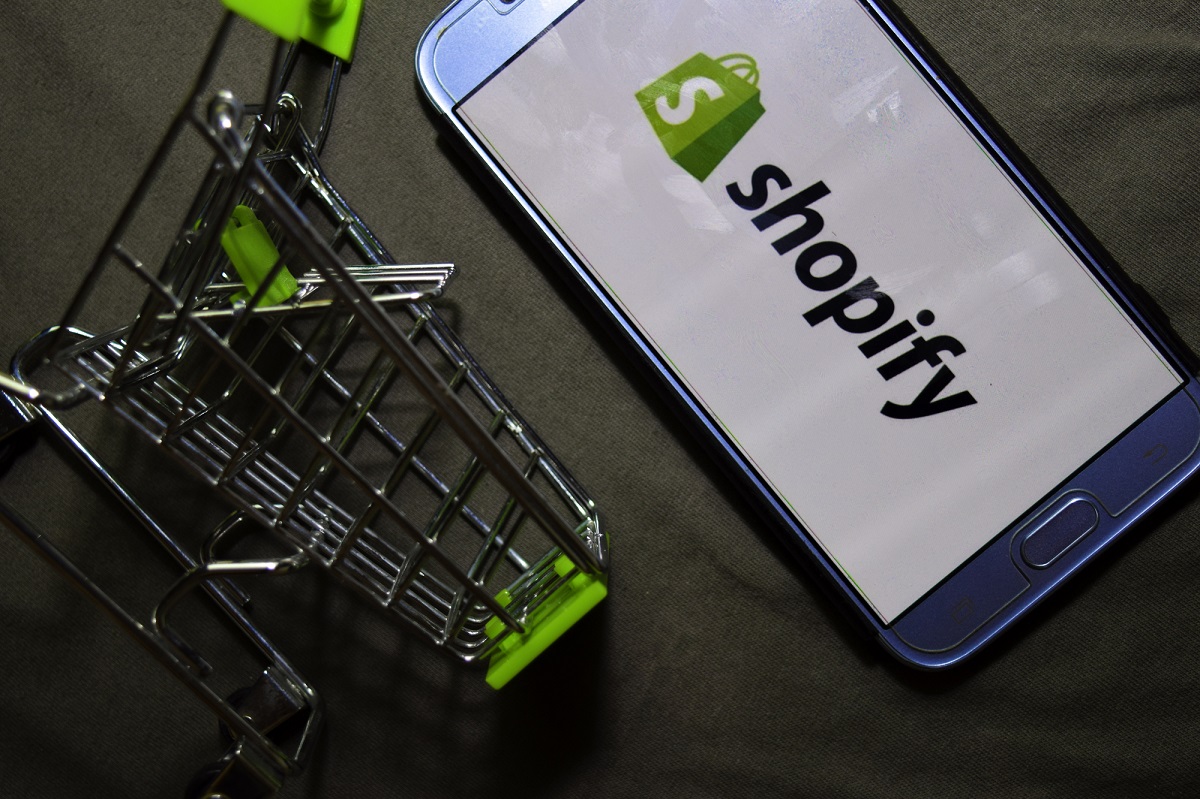 QR codes at Drake concerts provide guests access to branded merchandise 2 QR Code Shopify app on phone and shopping cart