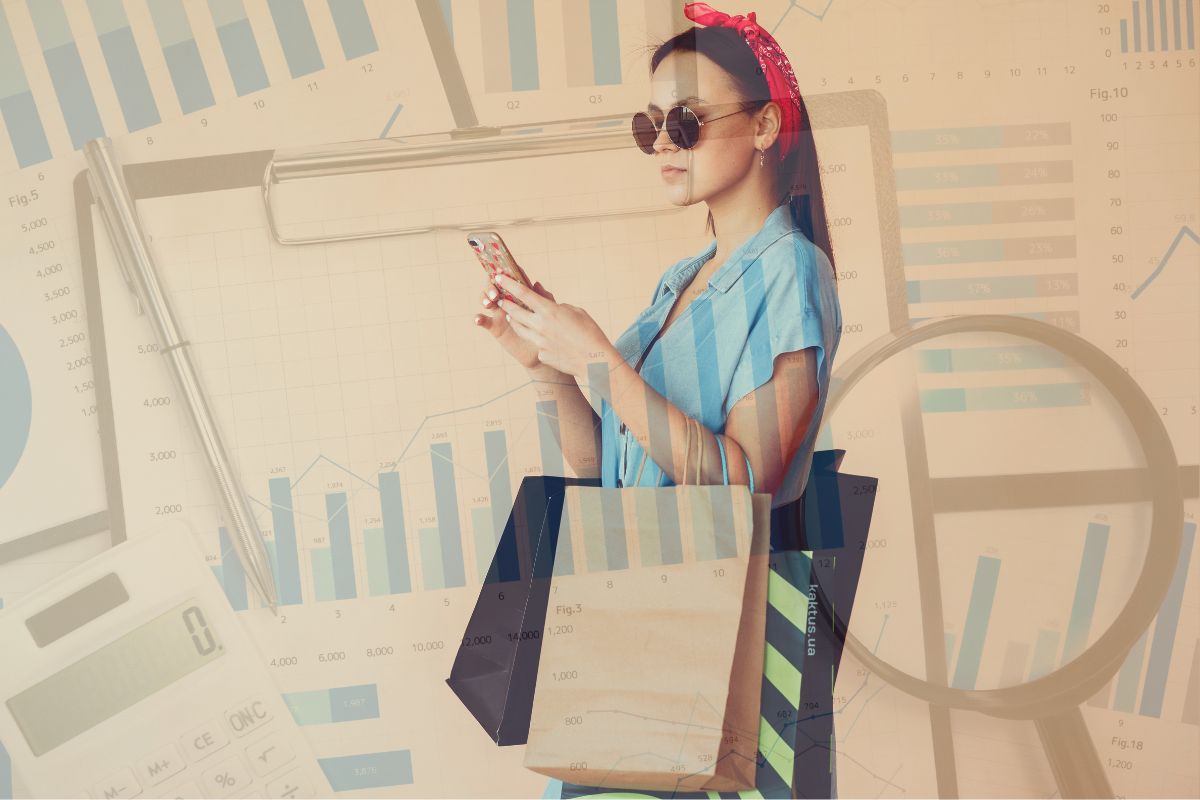 Mobile marketing - Person looking at phone holding shopping bags - data