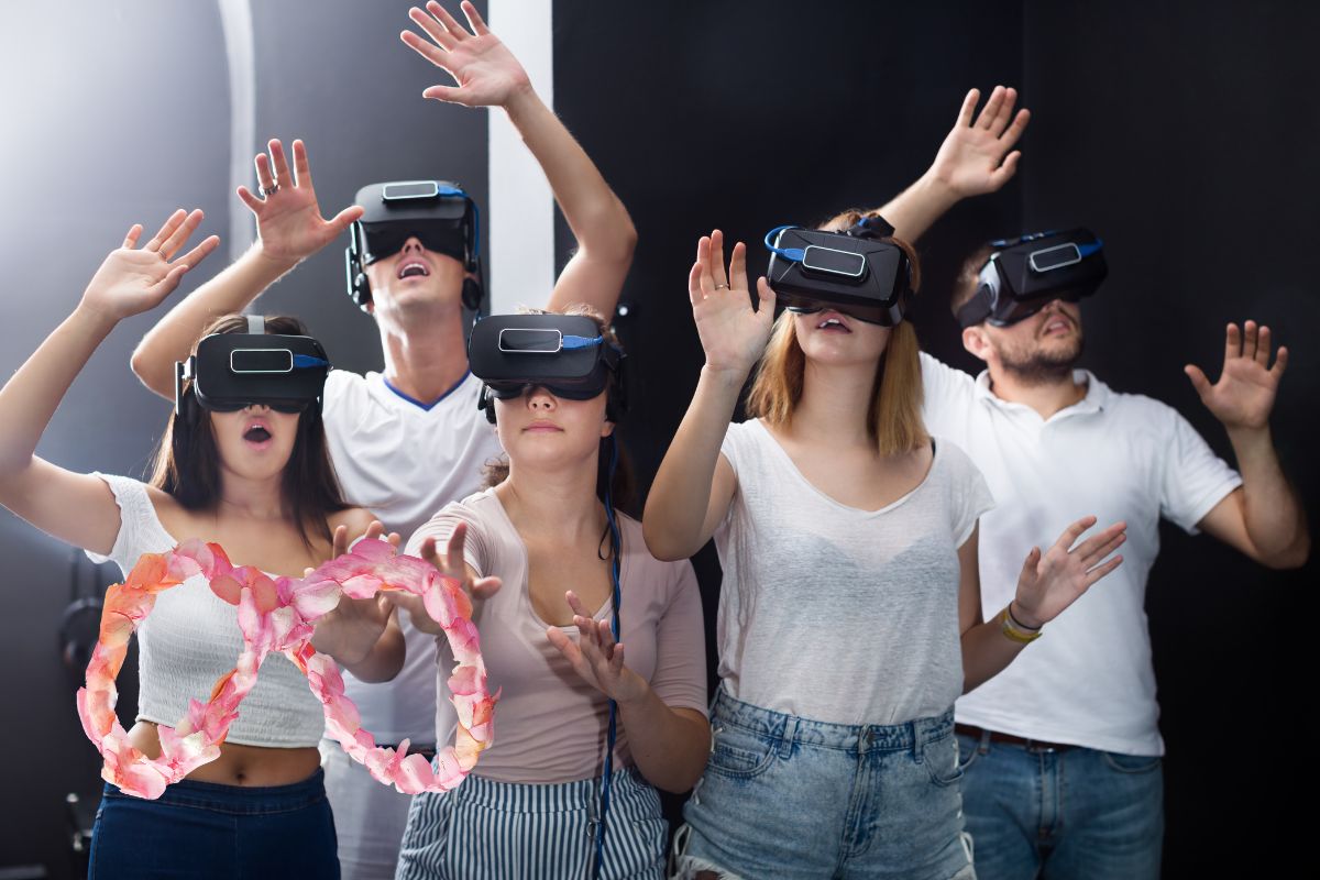 Virtual reality - Teens wearing VR headsets - Meta Logo made from flower petals